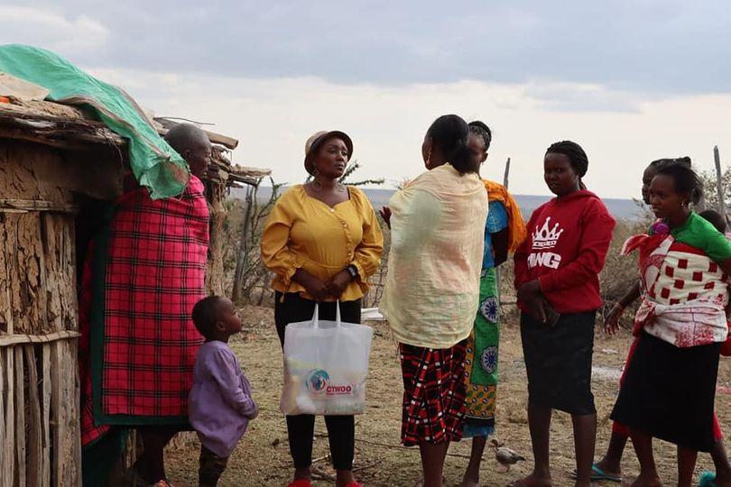 rural widows recieve relief food packages