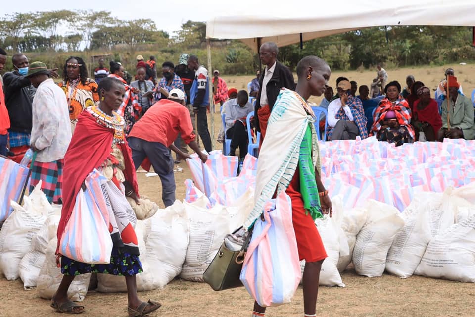 Widows recieve relief ( food packages ) from ComeTogether Widows and Orphans Organization in kenya